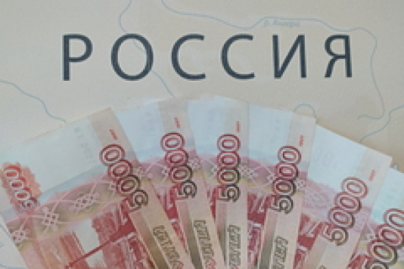Путин позволил компаниям расплачиваться с иностранными партнерами в рублях