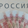 Путин позволил компаниям расплачиваться с иностранными партнерами в рублях